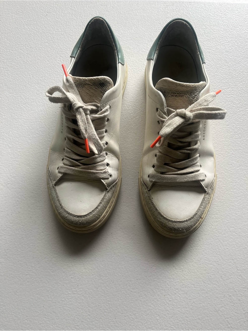 Axel Arigato White Leather Sneakers with Green Heel and Orange Lace Tips